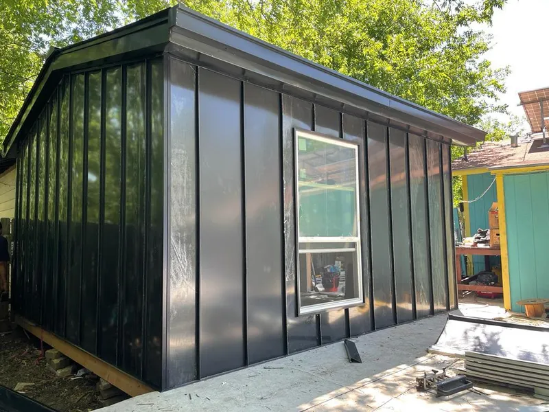 Black standing seam metal wall panels for Metal Roof Installation in Deptford
